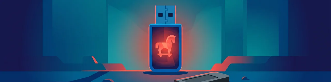 USB-Stick mit verstecktem Trojaner-Leuchten, ein zweiter Stick liegt als Köder am Boden